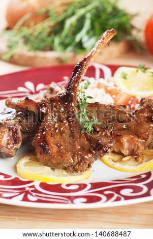 Roasted lamb chops with lemon and herbs