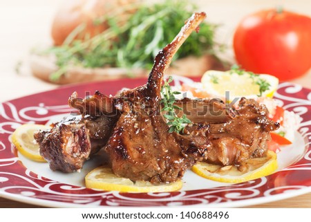 Roasted lamb chops with lemon and herbs