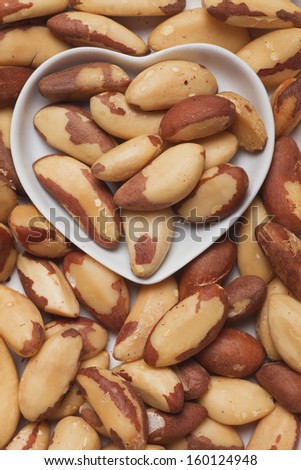 Brazil nut,healthy food in heart shaped tray