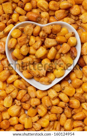 Fried corn snack in heart shaped tray