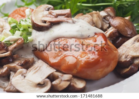 Grilled chicken breast with creamy mushroom sauce