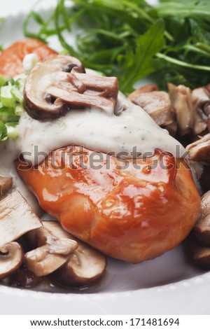 Grilled chicken breast with creamy mushroom sauce
