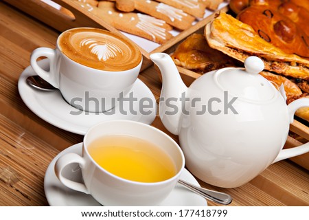 Beautiful cookie and bakery with cup of coffee and tea