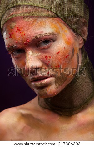 portrait of pretty girl with color face art