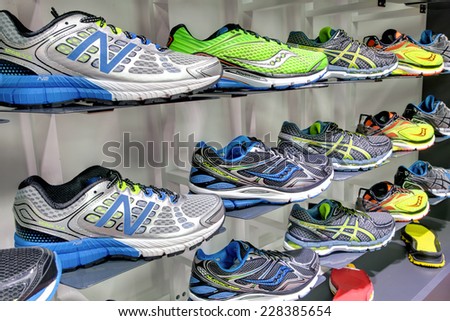 KIEV, UKRAINE - OCTOBER 26 2014: Exposition of New Balance and Saucony sport shoes. They are one of the world's largest suppliers of athletic shoes and apparel. October 26, 2014 in Kiev Ukraine