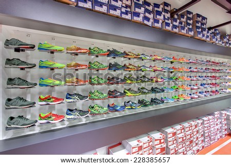 KIEV, UKRAINE - OCTOBER 26 2014: Exposition of New Balance and Saucony sport shoes. They are one of the world's largest suppliers of athletic shoes and apparel. October 26, 2014 in Kiev Ukraine