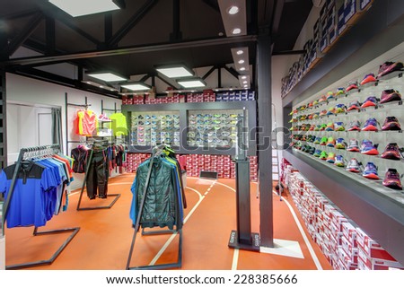KIEV, UKRAINE - OCTOBER 26 2014: Exposition of New Balance and Saucony sport shoes. They are one of the world\'s largest suppliers of athletic shoes and apparel. October 26, 2014 in Kiev Ukraine