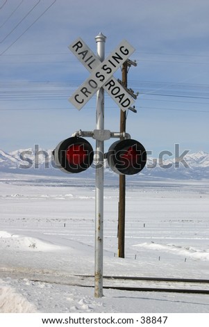 rail road crossing the snow