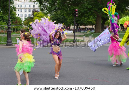 PARIS, FRANCE - JULY 07 : Carnival of the tropical dances with over 4000 participants from all over the globe organized in Paris, France 07.07.2012