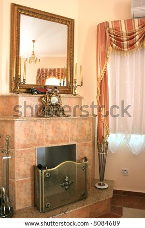 Fire-place,mirror,clock,candle-stick and candles,chandelier and etc.
