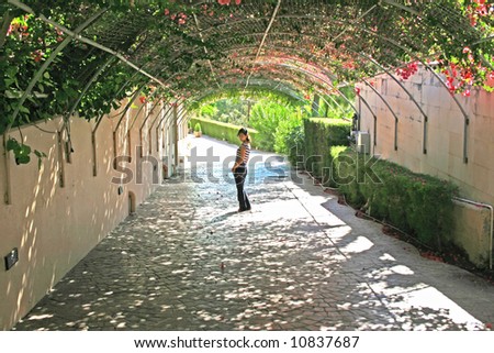 The girl in the flowers alley.
