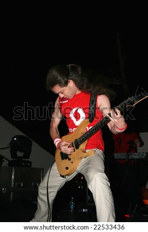 LIMASSOL,CYPRUS-JUNE 7:Guitarist Roman Valeryev of Russian heavy metal band Kolizey plays in Cypriot-Russian festival June 7, 2008 in Limassol,Cyprus.