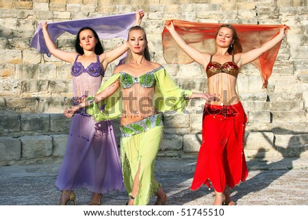 Beautiful belly dancers  on the ancient stairs of Kourion amphitheatre in Cyprus.