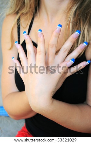Woman hands with nail art.