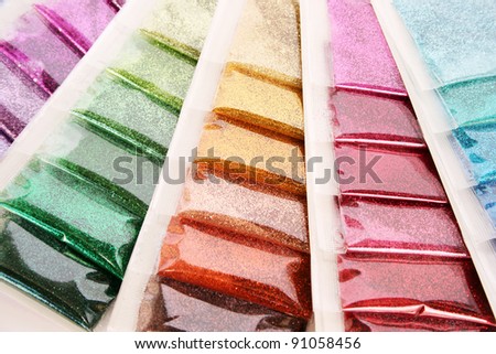 Colorful nail glitters as a  background.