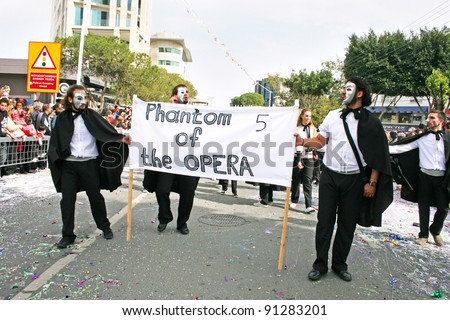 LIMASSOL,CYPRUS-MARCH 6, 2011: Unidentified people in opera phantom costume participates in the Cyprus carnival parade on March 6, 2011 in Limassol, Cyprus, established in 16th century, influenced by Venetian traditions.