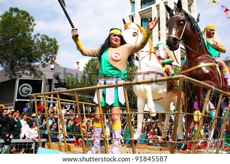 LIMASSOL ,CYPRUS-MARCH 6: Unidentified people in costumes participate in the Cyprus carnival parade on March 6, 2011 in Limassol, Cyprus. It was established in 16th century, influenced by Venetian traditions.