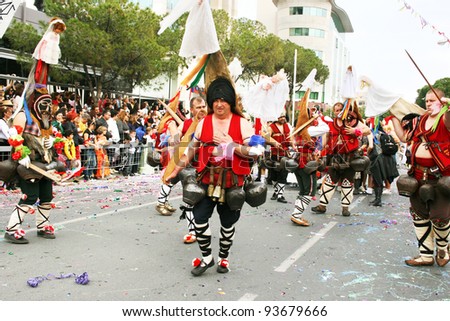 LIMASSOL,CYPRUS-MARCH 6, 2011: Unidentified Bulgarian people in national costumes  participate in the Cyprus carnival parade on March 6, 2011 in Limassol, Cyprus. The celebrations were established in 16th century, influenced by Venetians.