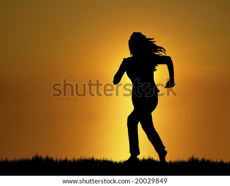 silhouette of woman running at sunset/sunrise