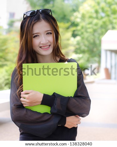Young women asian student in smiling face