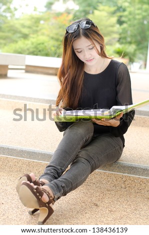 Asian women student looking profile in university and smiling face