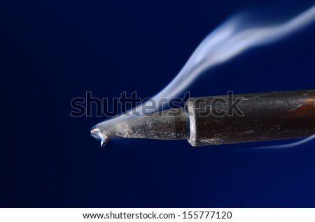 Hot soldering iron with smoke