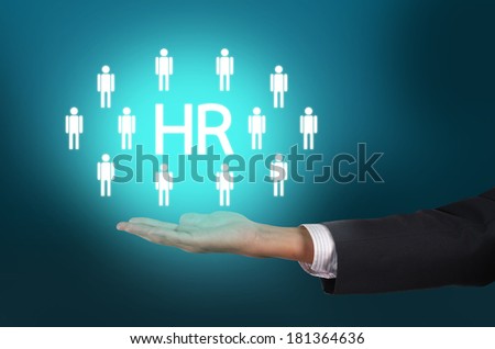 Customer care, care for employees, labor union, CRM, and life insurance concepts. Businessman holding manpower in corporate cloud concept