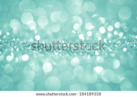 Bokeh abstract background wallpaper green blue diamond for design