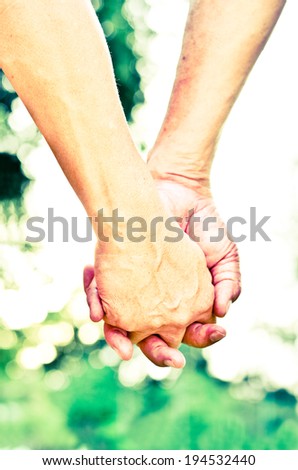 Close up old couple hands