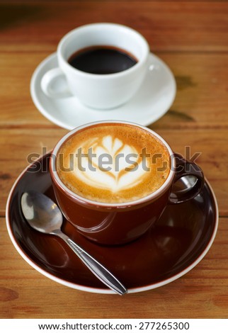Late coffee, Coffee foam, Coffee cup in coffee shop