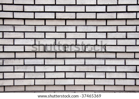 Grey bricks create a simple pattern perfect for a background image.