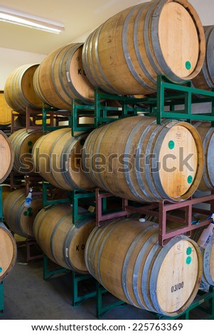 EUGENE, OR - JULY 17, 2014: Bourbon barrel aged beer aging in reused whiskey barrels at Oakshire Brewing.