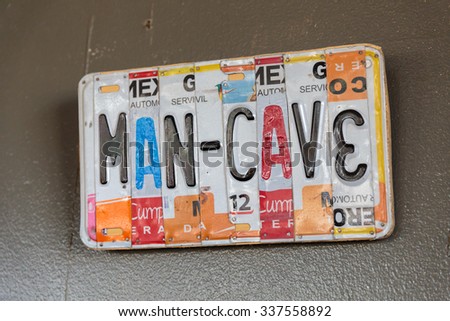 EUGENE, OR - NOVEMBER 4, 2015: License plate logo sign at the startup craft brewery Mancave Brewing.