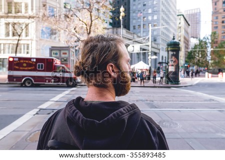 SAN FRANCISCO, CA - DECEMBER 11, 2015: Profile of a man looking to his right in downtown San Francisco.