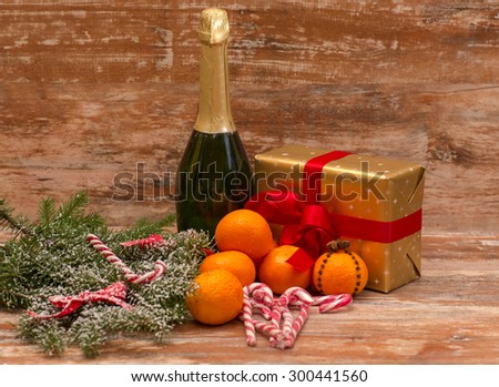 Two champagne glasses ready to bring in the New Year over wooden background
