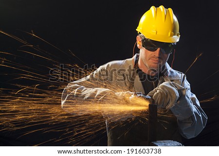 Workman in black background with sparkle