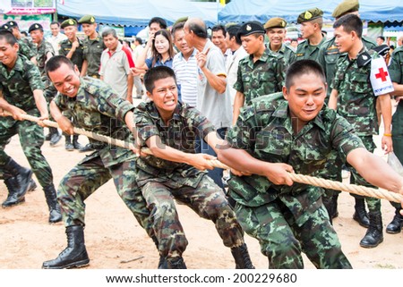 UBONRATCHATHANI, THAILAND - JUNE 18 :Unidentified soldiers compete in tug of war during at Social and community development, sustainable recovery happier on June 18, 2012 in Ubonratchathani, Thailand.