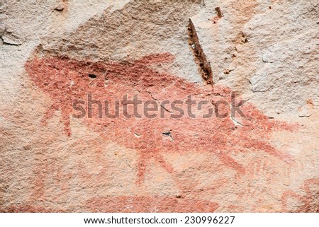 Abstract human art at Pha Taem prehistoric cliff painting which date back three thousands to four thousands years before history,Pha Taem National Park Ubon Ratchathani (Ubolratchathani) Thailand