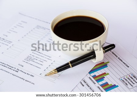 finance chart with coffee