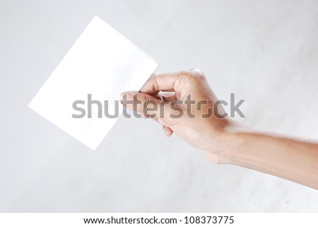 right-hand-held card gray background