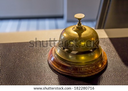 Hotel service bell on a reception counter