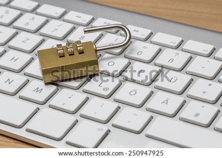 Modern silver keyboard with bress combination lock