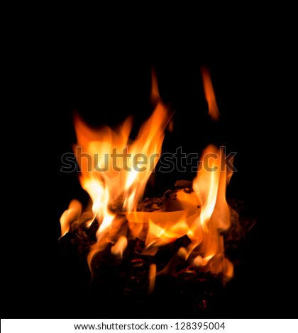 a photo of beautiful fire flame burns joss paper[ghost money]
