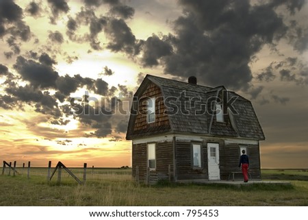 Prairie Landscape with an old house and person