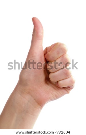 An adult female hand holding their thumb in the air. Seen from the side with the thumb bending backwards. Includes clipping path. - stock photo