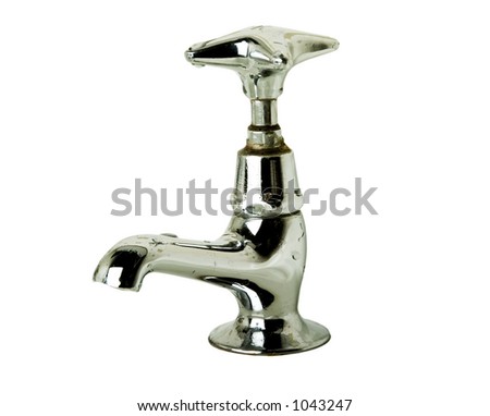 A retro bathroom sink tap isolated on white with clipping path.