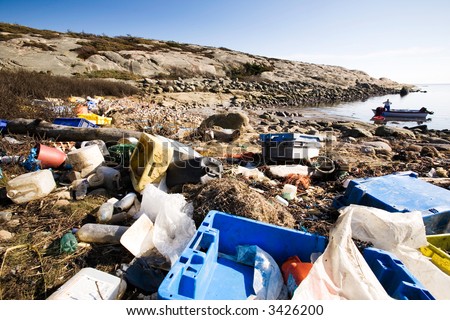 Garbage piled up on the coast of the ocean.