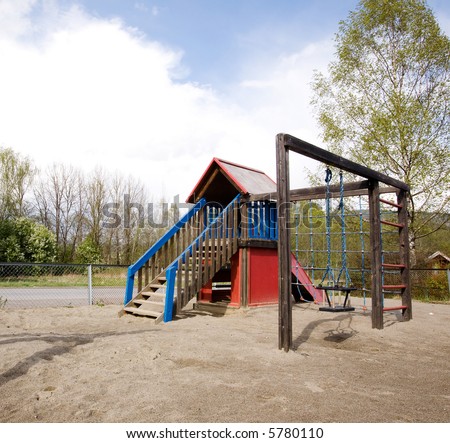 A typical playground with sand on the ground