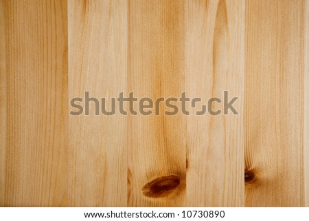 A light colored pine wood panneling background texture