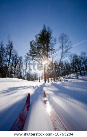 Motion action shot of cross country skiing.